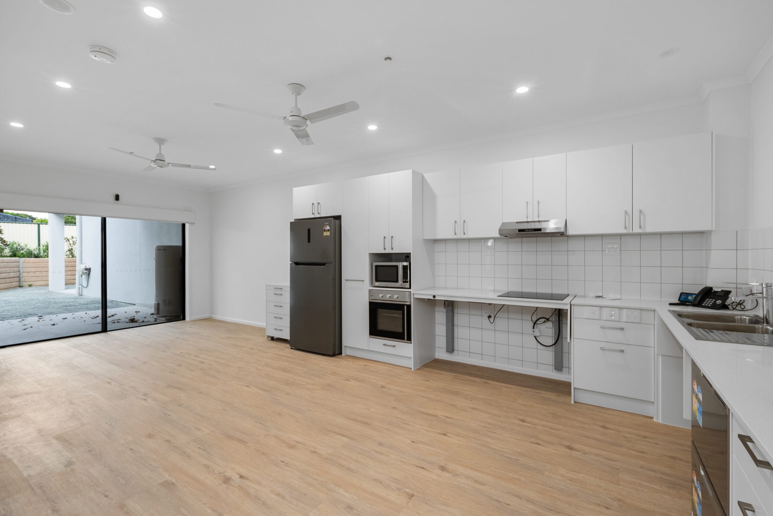 Modern High Physical Support SDA apartments in Algester, QLD – accessible design with ceiling hoists, smart home technology, and shared therapy facilities.