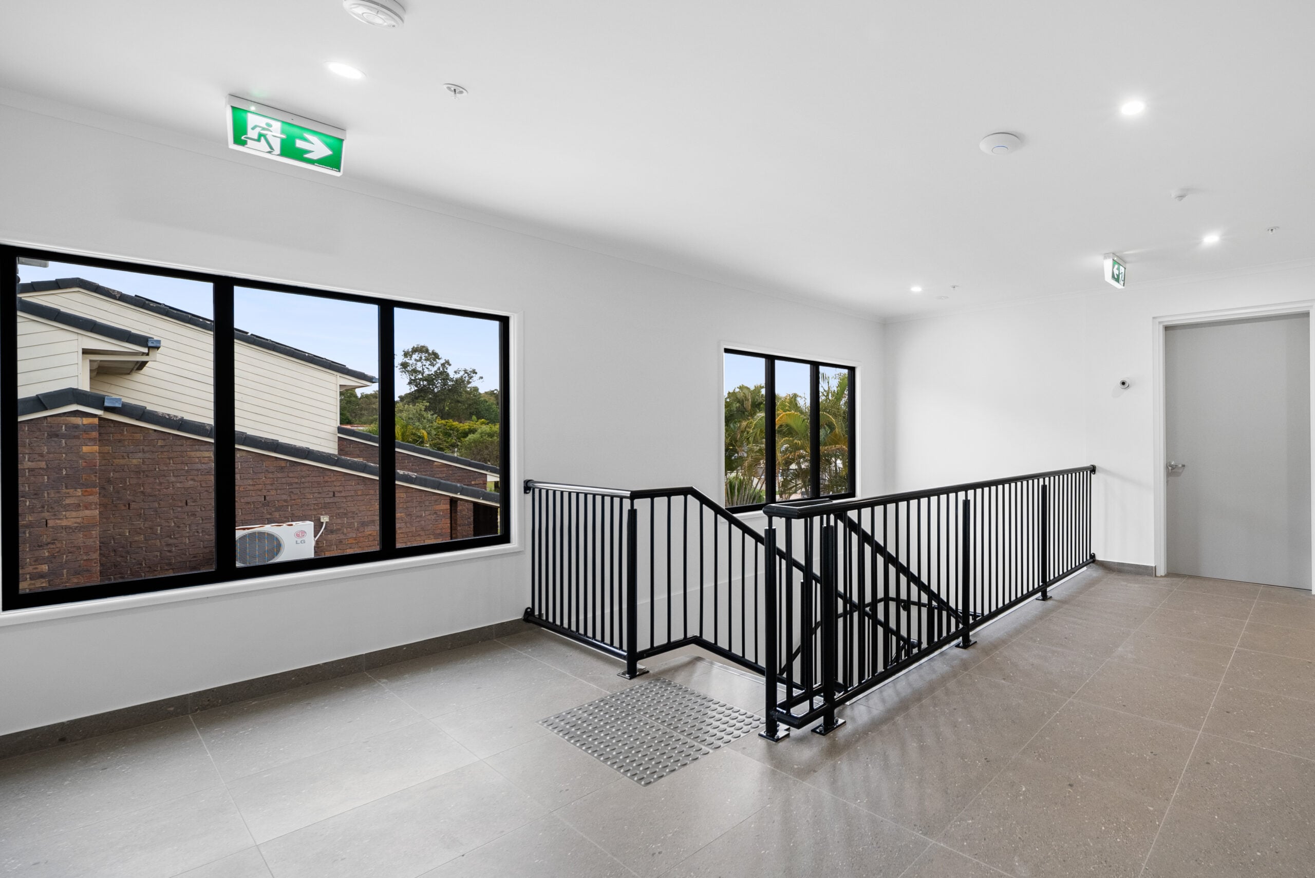Modern High Physical Support SDA apartments in Algester, QLD – accessible design with ceiling hoists, smart home technology, and shared therapy facilities.