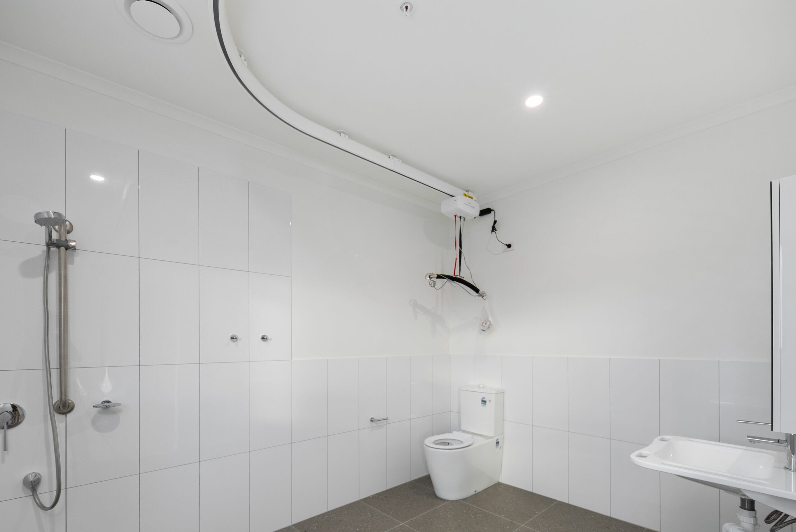 Modern High Physical Support SDA apartments in Algester, QLD – accessible design with ceiling hoists, smart home technology, and shared therapy facilities.